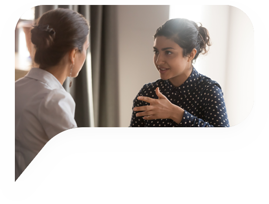 Two women in conversation around periods